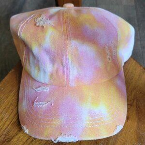 Distressed pink, white and orange tie dyed baseball hat with ponytail hole